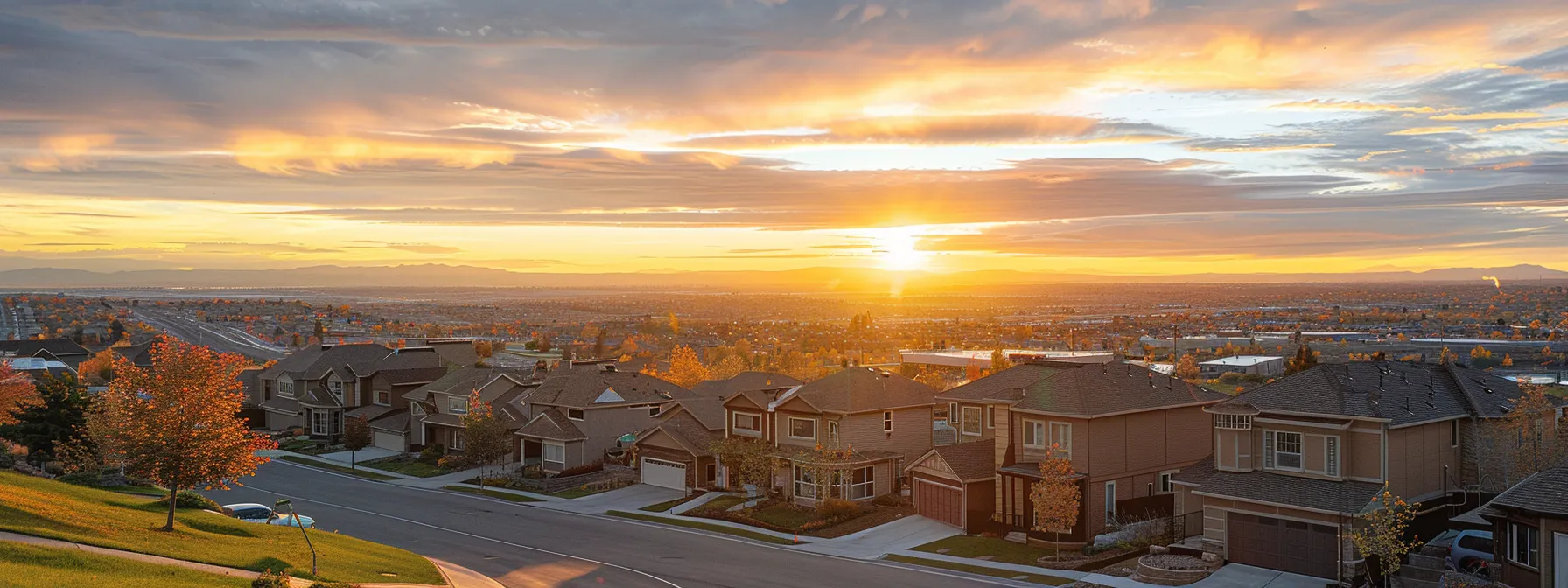 a beautiful sunset over a thriving st. george neighborhood, showcasing the potential for lucrative real estate investments.