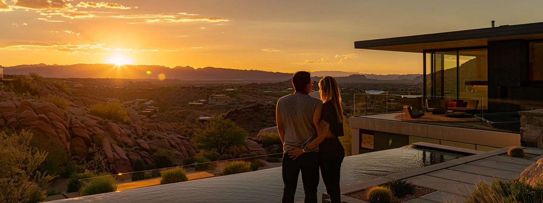 a couple admiring stunning modern homes with panoramic views in a luxurious st. george community.