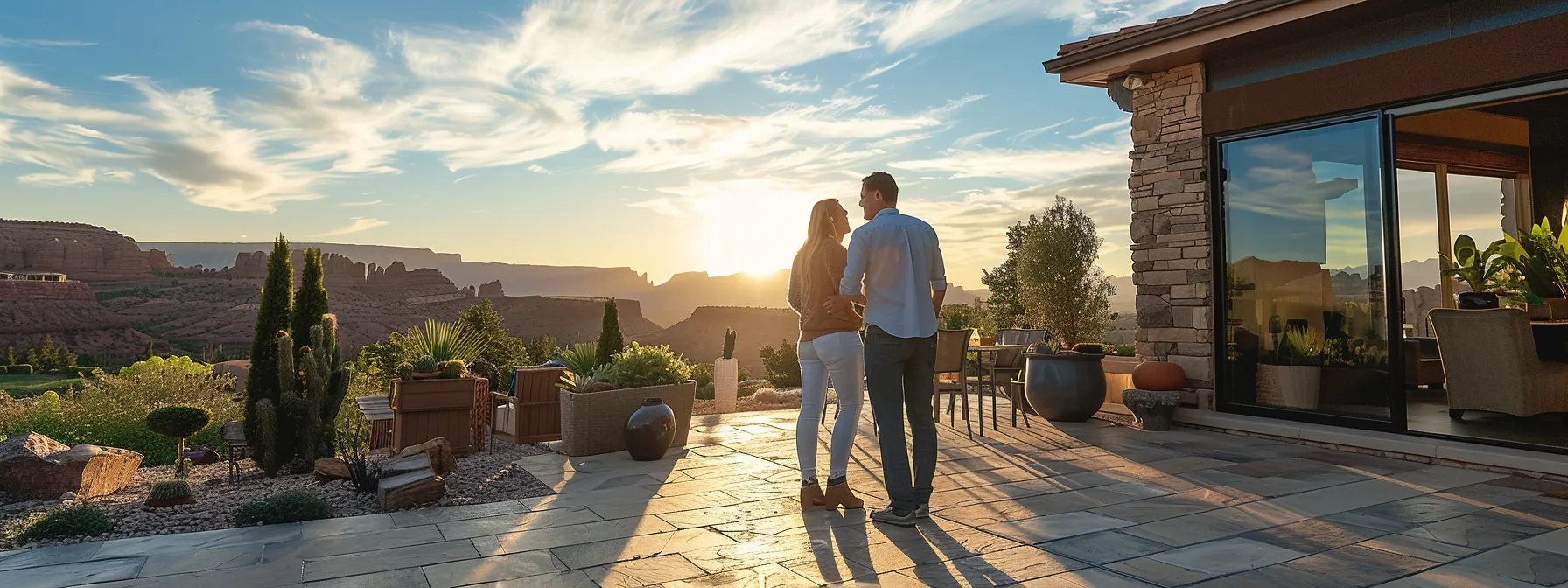 a couple discussing with their real estate agent while touring a spacious vacation home in st. george. a couple discussing with their real estate agent while touring a spacious vacation home in st. george.