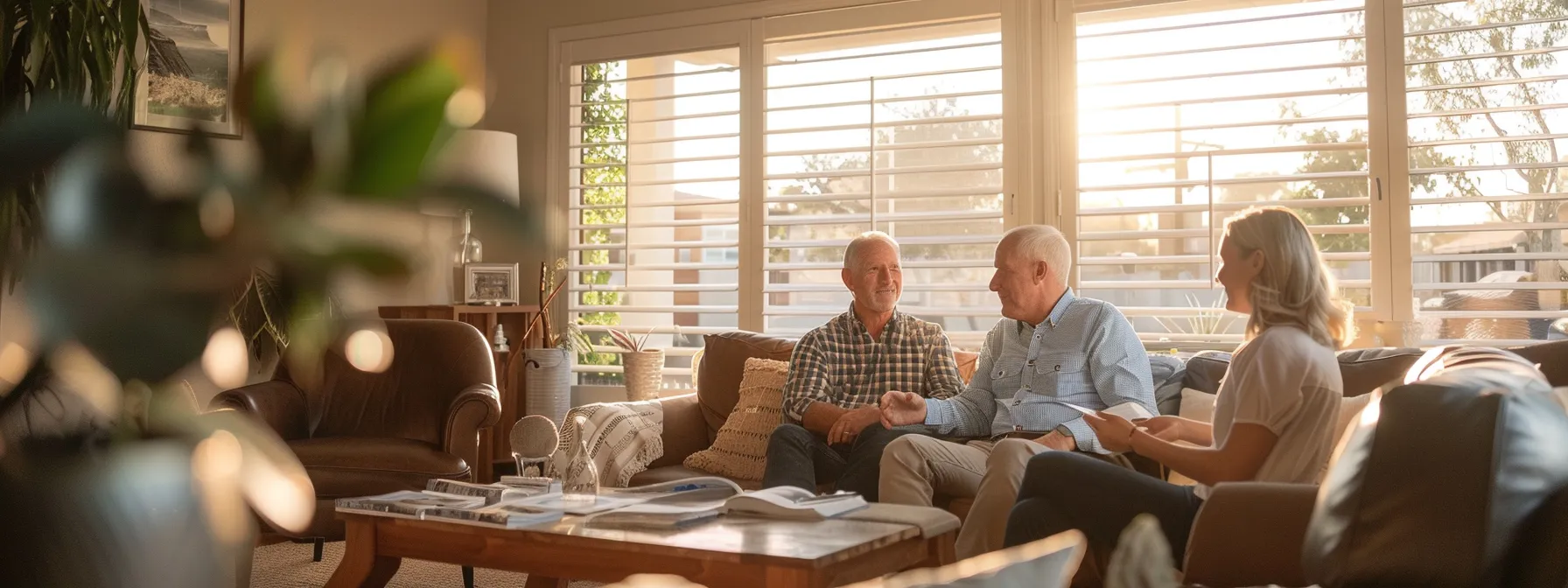 a couple in a sunny living room, confidently discussing offer terms with a real estate agent, surrounded by brochures of properties near golf courses and resorts in st. george.