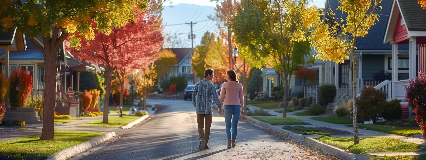 a couple walking down a tree-lined street, with colorful houses and friendly neighbors, symbolizing the ideal neighborhood in st. george.