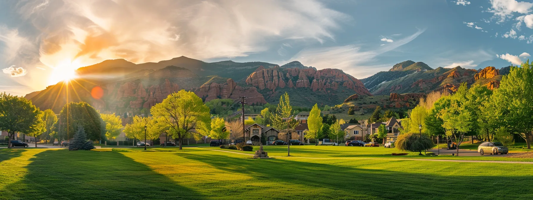 a vibrant photograph showcasing a picturesque neighborhood in st. george, with lush greenery, stunning mountain views, and a vibrant community park, highlighting the diverse environmental and lifestyle factors influencing property prices.