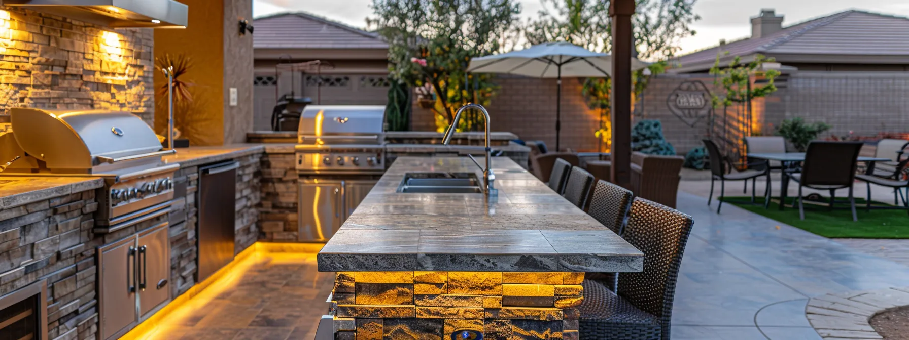 a cozy outdoor kitchen in a vibrant st george backyard, with a welcoming atmosphere perfect for family gatherings and community interactions.