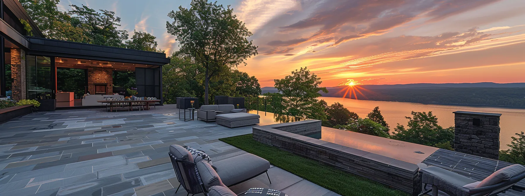 a sleek, modern outdoor living space overlooking a stunning scenic vista, featuring strategic screens and fencing to ensure privacy without compromising on views.